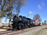 The 0-6-0 9 pushes the freight charter special back toward the S. Woodstown boarding platform